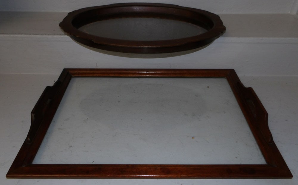 Mahogany Inlaid Oval Tray & Mahogany & Glass Tray: Mahogany Inlaid Oval Tray & Mahogany & Glass Tray. Up to 24 1/4" x 17 1/4" ALL DESCRIPTIONS AND ANY CONDITION STATEMENT GIVEN BY LANGSTON AUCTION GALLERY ARE STRICTLY OPINIONS AND LANGSTON'S SHALL HAV