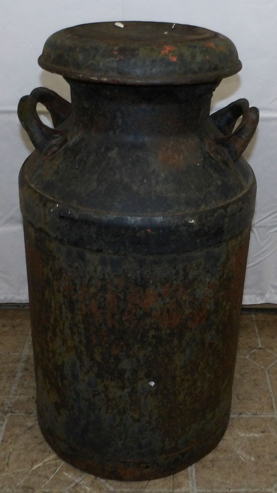 Antique Metal Milk Can: Antique Metal Milk Can . 25" H 12" Dia ALL DESCRIPTIONS AND ANY CONDITION STATEMENT GIVEN BY LANGSTON AUCTION GALLERY ARE STRICTLY OPINIONS AND LANGSTON'S SHALL HAVE NO RESPONSIBILITY FOR ERRORS OR OM