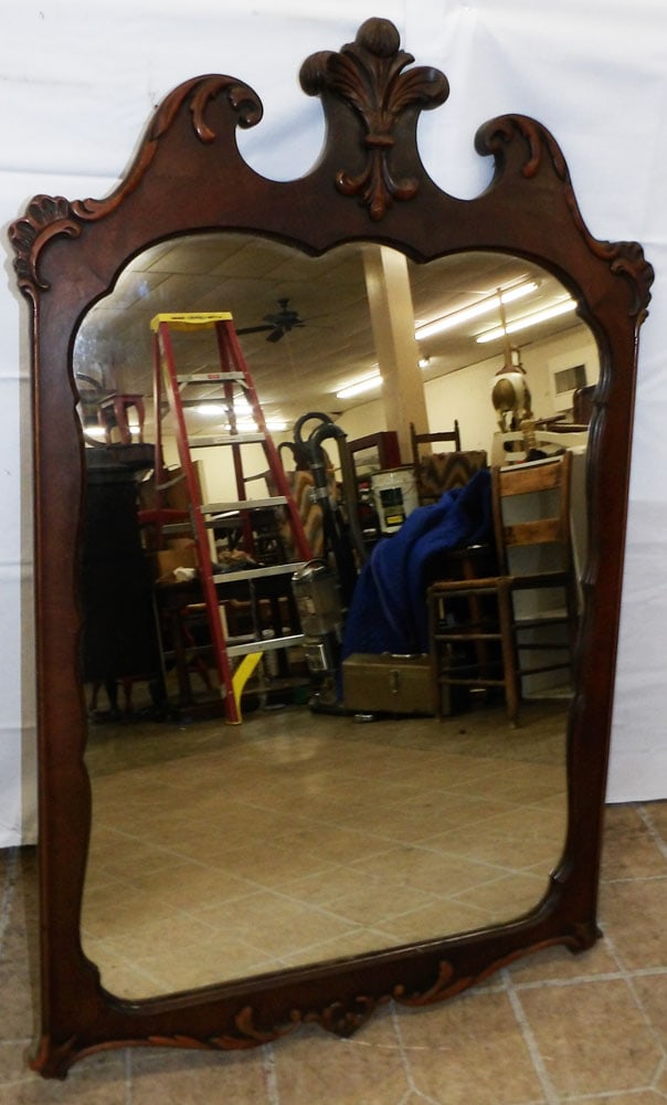 Mahogany Framed Mirror: Mahogany Framed Mirror. 43" X 27 1/2" ALL DESCRIPTIONS AND ANY CONDITION STATEMENT GIVEN BY LANGSTON AUCTION GALLERY ARE STRICTLY OPINIONS AND LANGSTON'S SHALL HAVE NO RESPONSIBILITY FOR ERRORS OR OMI