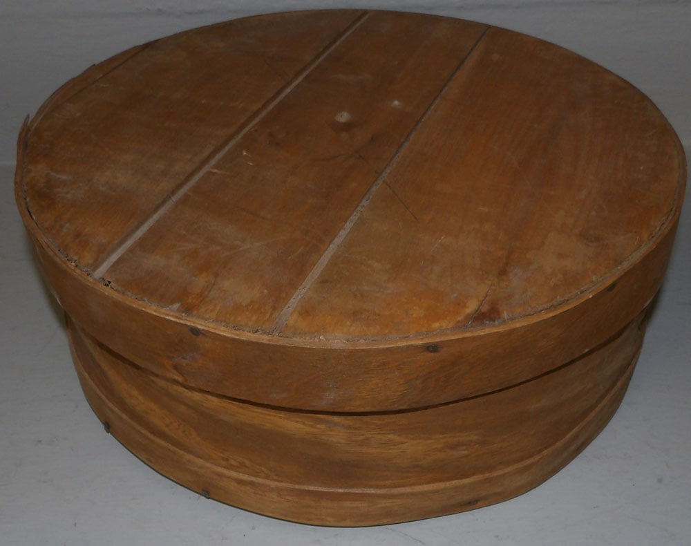 Wooden Pantry Box: Wooden Pantry Box. 6" H 15" Dia ALL DESCRIPTIONS AND ANY CONDITION STATEMENT GIVEN BY LANGSTON AUCTION GALLERY ARE STRICTLY OPINIONS AND LANGSTON'S SHALL HAVE NO RESPONSIBILITY FOR ERRORS OR OMISSIONS