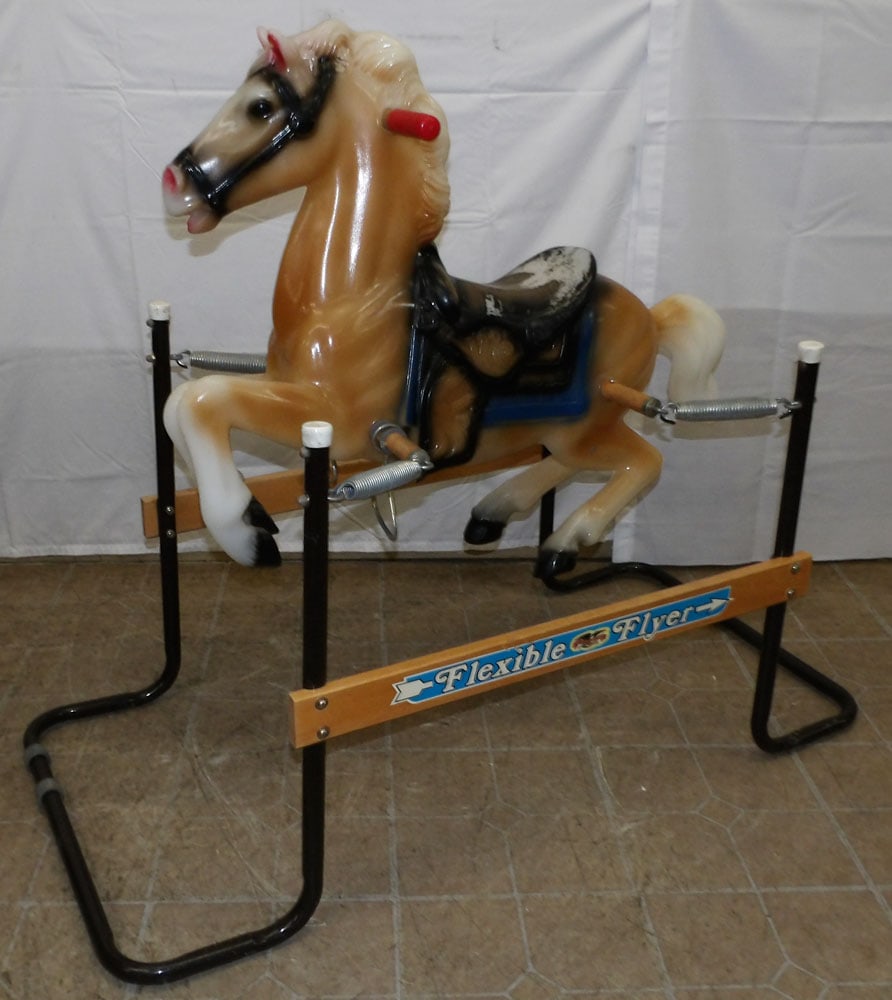 Vintage Flexible Flyer Hobby Horse: Vintage Flexible Flyer Hobby Horse . 39" H 47 1/2" W 23" D ALL DESCRIPTIONS AND ANY CONDITION STATEMENT GIVEN BY LANGSTON AUCTION GALLERY ARE STRICTLY OPINIONS AND LANGSTON'S SHALL HAVE NO RESPONSIBIL