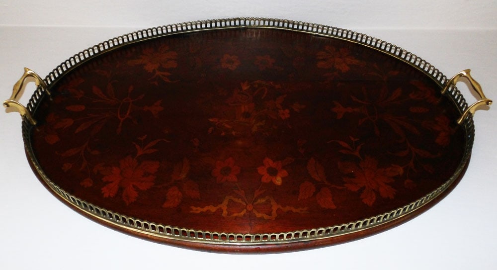 Antique Mahogany Marquetry Inlaid Oval Tray with Brass Gallery: Antique Mahogany Marquetry Inlaid Oval Tray with Brass Gallery. 2 1/4" H 26 1/2" W 17 1/2" D ALL DESCRIPTIONS AND ANY CONDITION STATEMENT GIVEN BY LANGSTON AUCTION GALLERY ARE STRICTLY OPINIONS AND LA