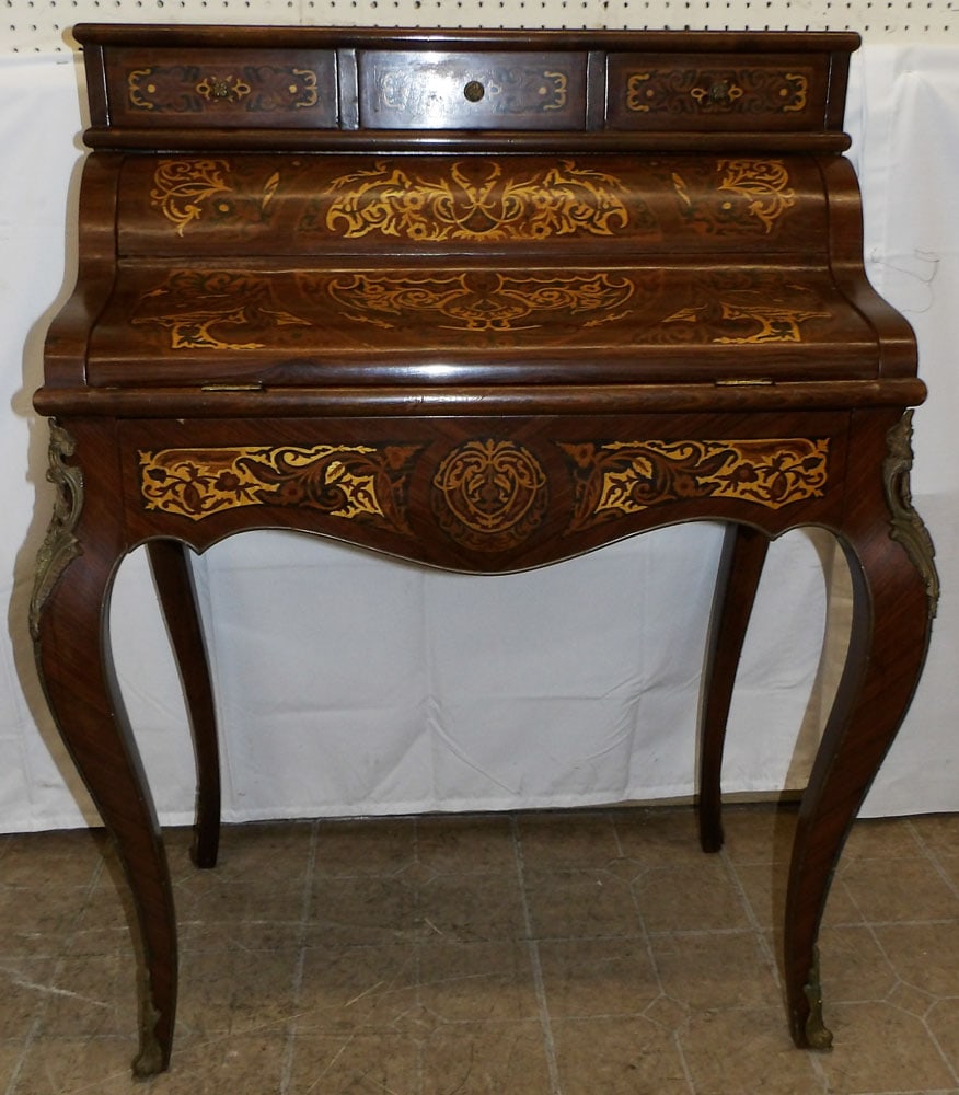 French Inlaid Rosewood Ladies Desk With Bronze Ormolu: French Inlaid Rosewood Ladies Desk With Bronze Ormolu. 43 1/2" H 34 1/4" W 21 1/2" D ALL DESCRIPTIONS AND ANY CONDITION STATEMENT GIVEN BY LANGSTON AUCTION GALLERY ARE STRICTLY OPINIONS AND LANGSTON'S