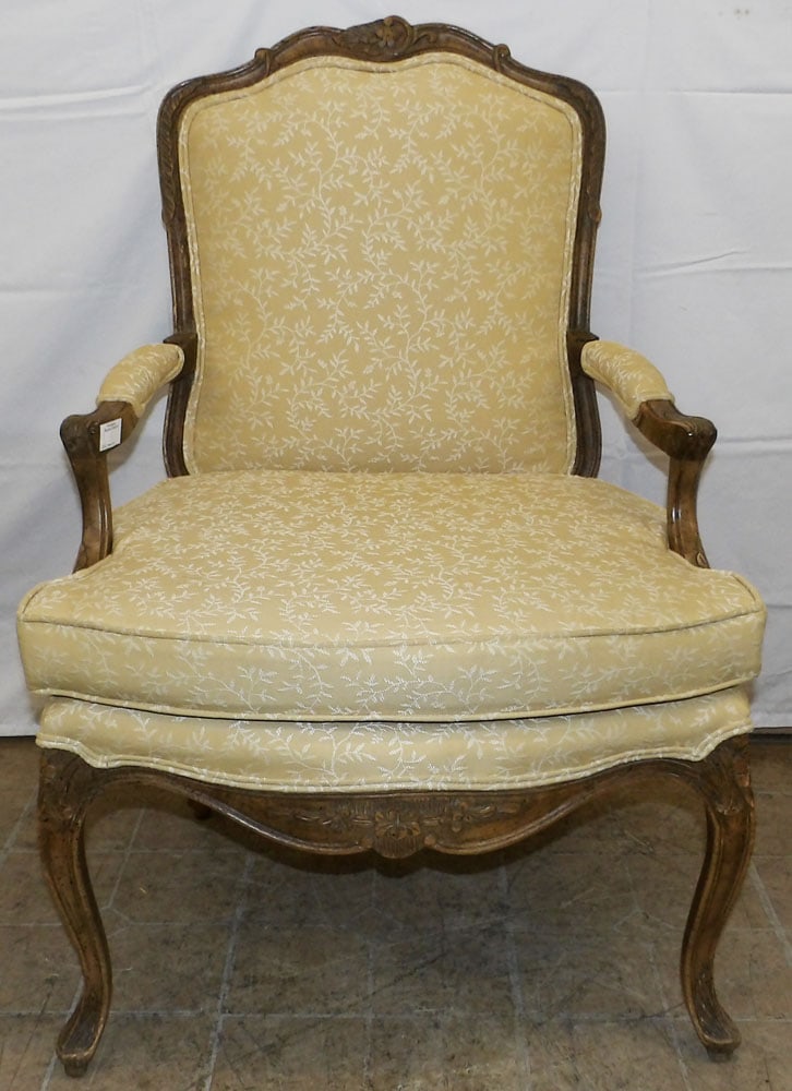 Walnut Carved Upholstered Fauteuil: Walnut Carved Upholstered Fauteuil. 38" H 26" W 21" D ALL DESCRIPTIONS AND ANY CONDITION STATEMENT GIVEN BY LANGSTON AUCTION GALLERY ARE STRICTLY OPINIONS AND LANGSTON'S SHALL HAVE NO RESPONSIBILITY F