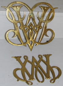 Two Brass Virginia Metalcrafters Trivets, (Queen Anne Cypher & William & Mary Cypher)