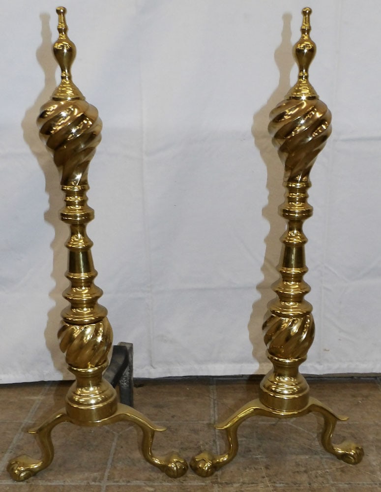 Pair of Brass Andirons: Pair of Brass Andirons. 23" H 10" W 9 1/4" D ALL DESCRIPTIONS AND ANY CONDITION STATEMENT GIVEN BY LANGSTON AUCTION GALLERY ARE STRICTLY OPINIONS AND LANGSTON'S SHALL HAVE NO RESPONSIBILITY FOR ERRORS