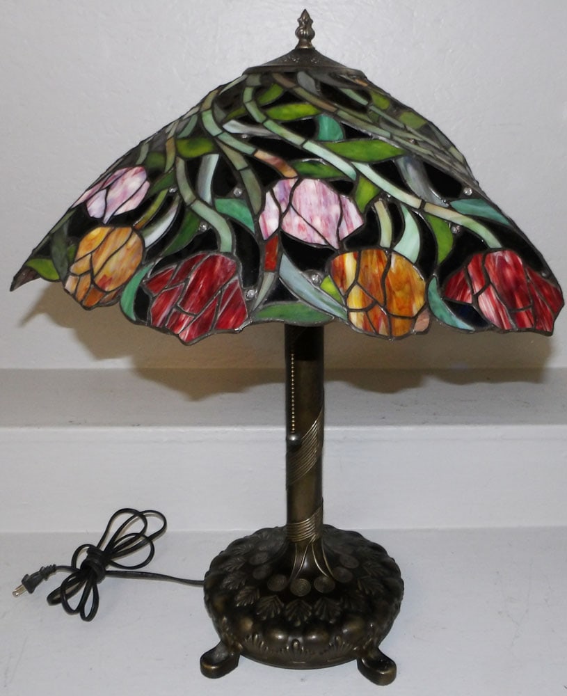 Leaded Stained Glass Tiffany Style Lamp: Leaded Stained Glass Tiffany Style Lamp. 24 1/2" H 20 1/2" Dia. ALL DESCRIPTIONS AND ANY CONDITION STATEMENT GIVEN BY LANGSTON AUCTION GALLERY ARE STRICTLY OPINIONS AND LANGSTON'S SHALL HAVE NO RESPON
