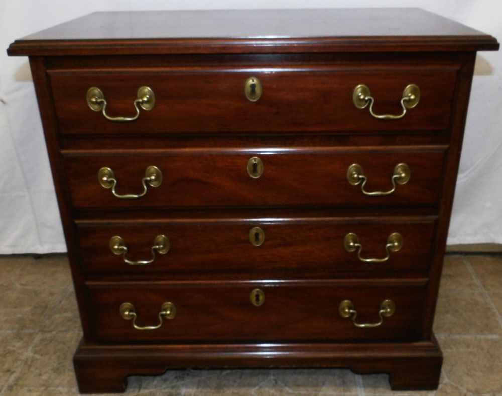 Mahogany Four Drawer Diminutive Chest by Henkel Harris: Mahogany Four Drawer Diminutive Chest by Henkel Harris. 23" H 24" W 14 1/2" D ALL DESCRIPTIONS AND ANY CONDITION STATEMENT GIVEN BY LANGSTON AUCTION GALLERY ARE STRICTLY OPINIONS AND LANGSTON'S SHALL