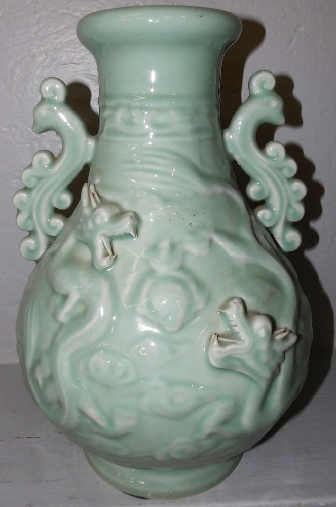 Oriental Celadon Porcelain Urn Signed with Character Marks: Oriental Celadon Porcelain Urn Signed with Character Marks. 15 3/4" H 10 1/2" Dia. ALL DESCRIPTIONS AND ANY CONDITION STATEMENT GIVEN BY LANGSTON AUCTION GALLERY ARE STRICTLY OPINIONS AND LANGSTON'S S