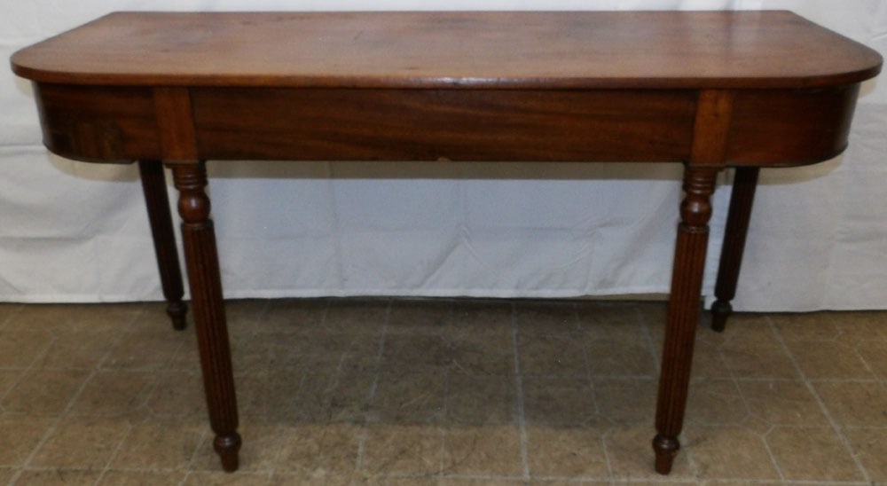 19th Century Mahogany Sheraton Console: 19th Century Mahogany Sheraton Console . 28 3/4" H 54" W 22 1/4" D ALL DESCRIPTIONS AND ANY CONDITION STATEMENT GIVEN BY LANGSTON AUCTION GALLERY ARE STRICTLY OPINIONS AND LANGSTON'S SHALL HAVE NO RES