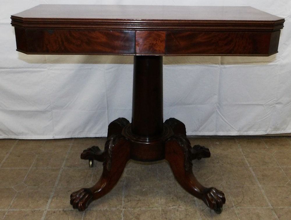 19th Century Carved Mahogany Fold Over Top Game Table: 19th Century Carved Mahogany Fold Over Top Game Table. 30 1/4" H 35 3/4" W 17 1/2" D ALL DESCRIPTIONS AND ANY CONDITION STATEMENT GIVEN BY LANGSTON AUCTION GALLERY ARE STRICTLY OPINIONS AND LANGSTON'S
