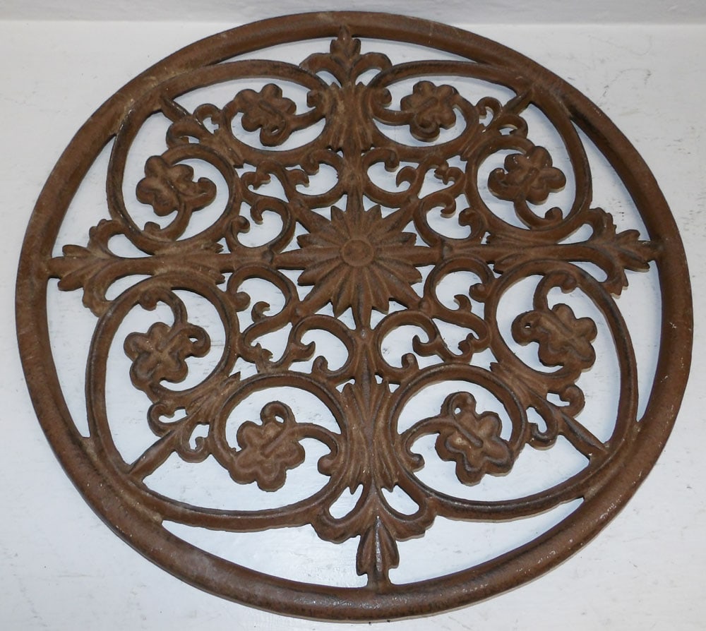 Cast Iron Stand: Cast Iron Stand . 17 1/4" Dia ALL DESCRIPTIONS AND ANY CONDITION STATEMENT GIVEN BY LANGSTON AUCTION GALLERY ARE STRICTLY OPINIONS AND LANGSTON'S SHALL HAVE NO RESPONSIBILITY FOR ERRORS OR OMISSIONS.