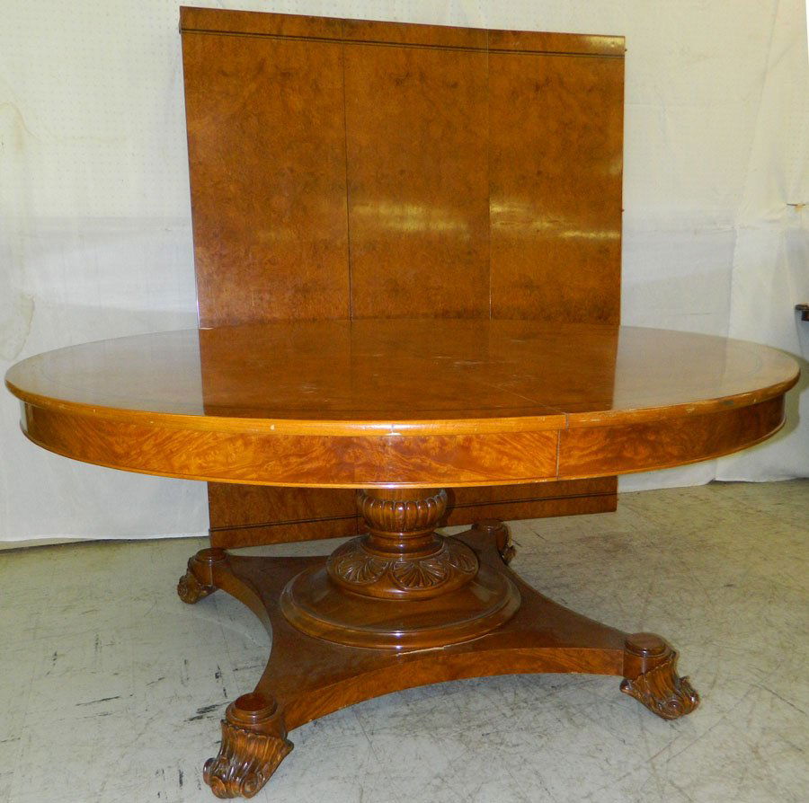 Burl walnut extension table with painted ebony.: Burl walnut extension table with painted ebony. 67" round x 66 1/2" diameter without leaves. Includes 3 leaves that measure 19 3/4" each.