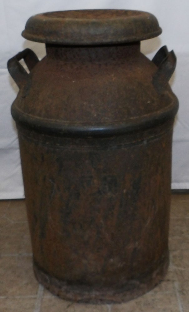 Antique Metal Milk Can: Antique Metal Milk Can. 22 3/4" H 13" Dia ALL DESCRIPTIONS AND ANY CONDITION STATEMENT GIVEN BY LANGSTON AUCTION GALLERY ARE STRICTLY OPINIONS AND LANGSTON'S SHALL HAVE NO RESPONSIBILITY FOR ERRORS OR