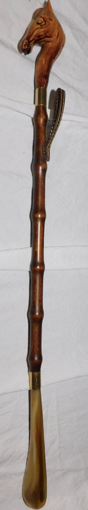 Bamboo Carved Horse Head Shoe Horn: Bamboo Carved Horse Head Shoe Horn. 22 1/4" Long ALL DESCRIPTIONS AND ANY CONDITION STATEMENT GIVEN BY LANGSTON AUCTION GALLERY ARE STRICTLY OPINIONS AND LANGSTON'S SHALL HAVE NO RESPONSIBILITY FOR ER