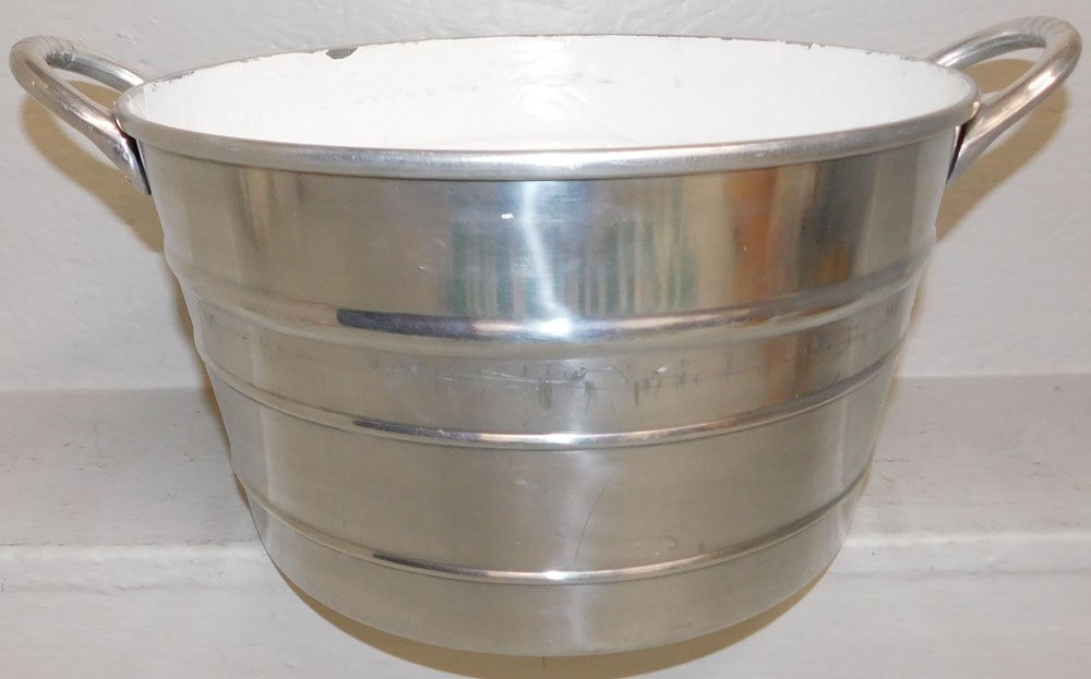 Aluminum Wine Cooler: Aluminum Wine Cooler. 10" H 18 1/2" Dia ALL DESCRIPTIONS AND ANY CONDITION STATEMENT GIVEN BY LANGSTON AUCTION GALLERY ARE STRICTLY OPINIONS AND LANGSTON'S SHALL HAVE NO RESPONSIBILITY FOR ERRORS OR O