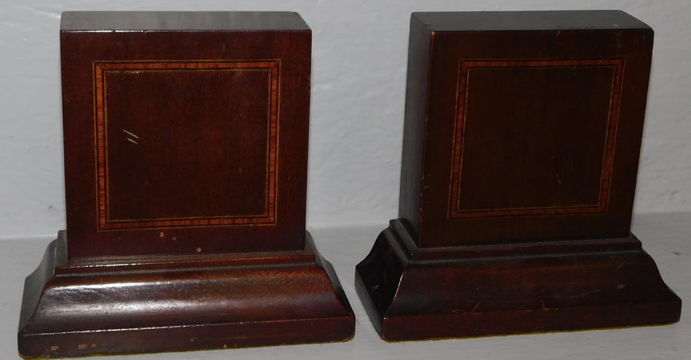 Pair Mahogany Inlay Bookends: Pair Mahogany Inlay Bookends. 6 3/4" H 7" W 2 3/4" D ALL DESCRIPTIONS AND ANY CONDITION STATEMENT GIVEN BY LANGSTON AUCTION GALLERY ARE STRICTLY OPINIONS AND LANGSTON'S SHALL HAVE NO RESPONSIBILITY FO