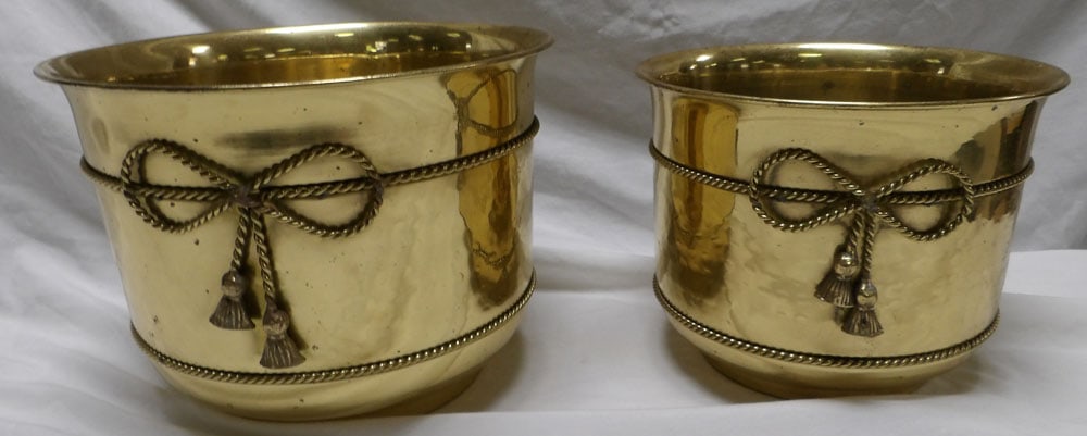 Two Brass Jardinières: Two Brass Jardinières. 9" H 11 1/2" Dia ALL DESCRIPTIONS AND ANY CONDITION STATEMENT GIVEN BY LANGSTON AUCTION GALLERY ARE STRICTLY OPINIONS AND LANGSTON'S SHALL HAVE NO RESPONSIBILITY FOR ERRORS