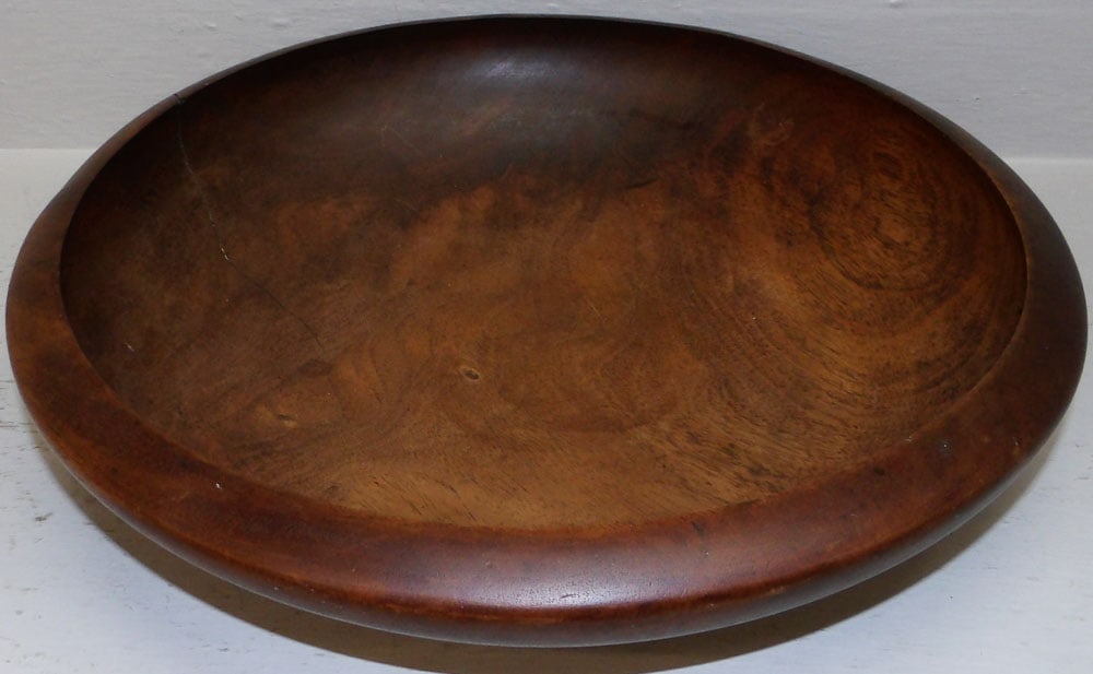 Mid Century Modern Wooden Bowl: Mid Century Modern Wooden Bowl. 4 1/2" H 18" Dia ALL DESCRIPTIONS AND ANY CONDITION STATEMENT GIVEN BY LANGSTON AUCTION GALLERY ARE STRICTLY OPINIONS AND LANGSTON'S SHALL HAVE NO RESPONSIBILITY FOR ER
