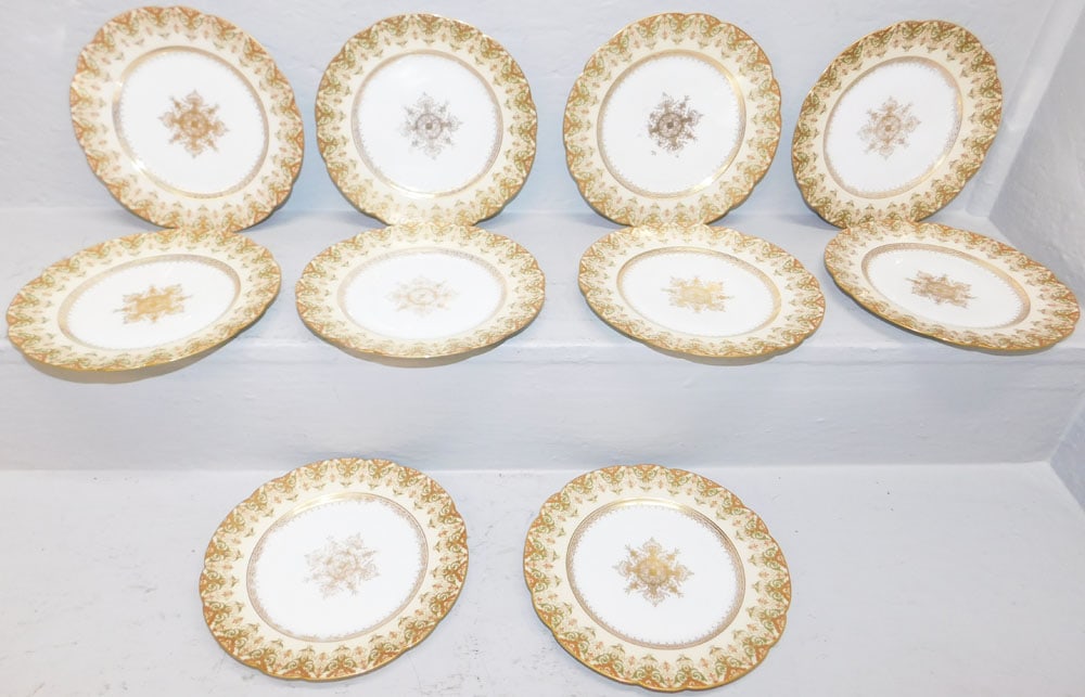 Ten Limoges Hand Painted Porcelain Plates: Ten Limoges Hand Painted Porcelain Plates . 8 1/4" Dia ALL DESCRIPTIONS AND ANY CONDITION STATEMENT GIVEN BY LANGSTON AUCTION GALLERY ARE STRICTLY OPINIONS AND LANGSTON'S SHALL HAVE NO RESPONSIBILITY 
