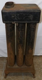 Antique Cast Iron Heater By  Floyd Wells Co.