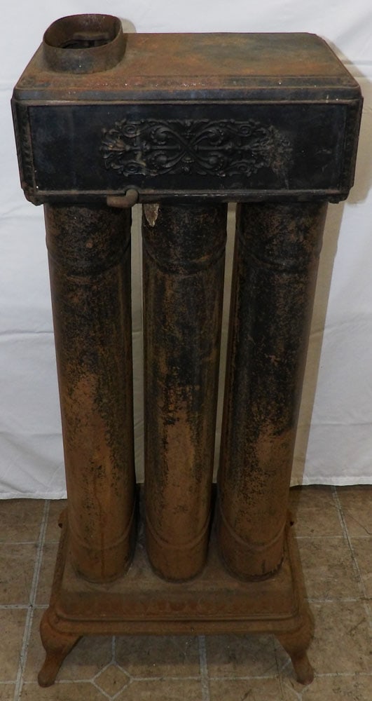 Antique Cast Iron Heater By  Floyd Wells Co. (1 of 7)