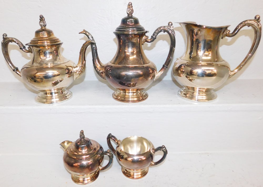 Lot Silver Plate Items: Lot Silver Plate Items. 10" X 10 1/2" ALL DESCRIPTIONS AND ANY CONDITION STATEMENT GIVEN BY LANGSTON AUCTION GALLERY ARE STRICTLY OPINIONS AND LANGSTON'S SHALL HAVE NO RESPONSIBILITY FOR ERRORS OR OMI