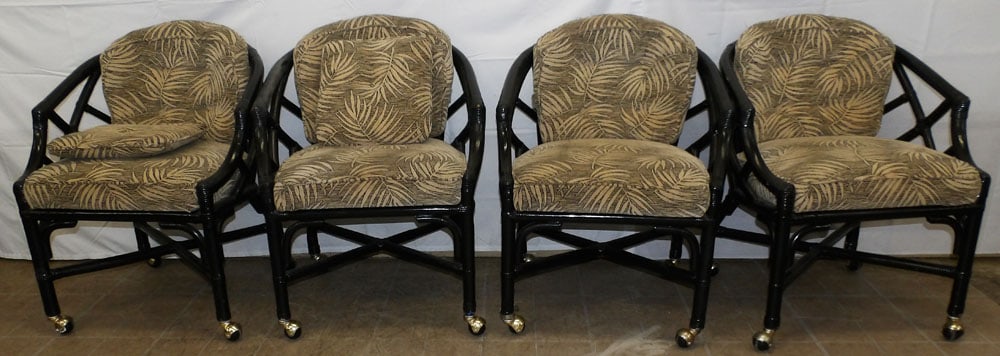 Set Four Painted Rattan Arm Chairs On Castors: Set Four Painted Rattan Arm Chairs On Castors. 30" H 25" W 25 1/2" D ALL DESCRIPTIONS AND ANY CONDITION STATEMENT GIVEN BY LANGSTON AUCTION GALLERY ARE STRICTLY OPINIONS AND LANGSTON'S SHALL HAVE NO R