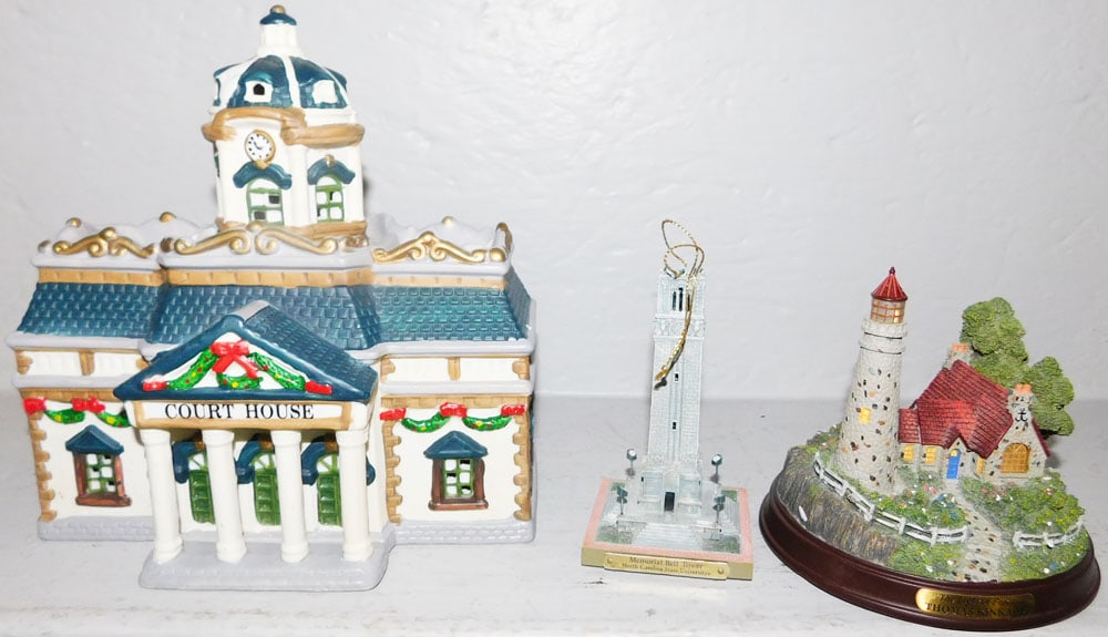 Christmas Village House & Thomas Kinkade Lighthouse - NC State Ornament: Christmas Village House & Thomas Kinkade Lighthouse - NC State Ornament. 9 1/2" H 9" W 6" D ALL DESCRIPTIONS AND ANY CONDITION STATEMENT GIVEN BY LANGSTON AUCTION GALLERY ARE STRICTLY OPINIONS AND LAN