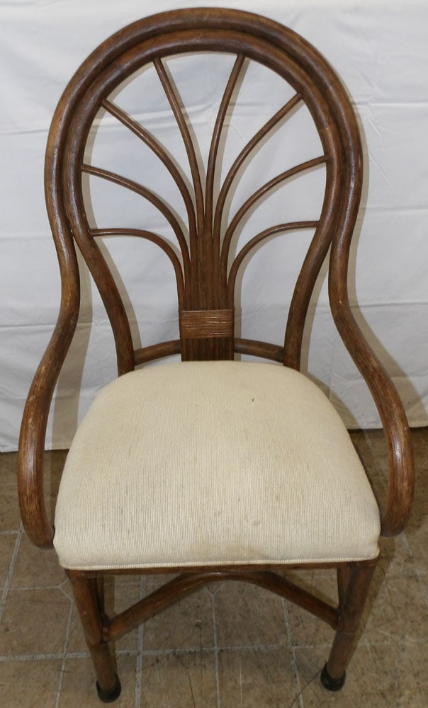 Rattan Arm Chair: Rattan Arm Chair. 42" H 20 1/2" W 19" D ALL DESCRIPTIONS AND ANY CONDITION STATEMENT GIVEN BY LANGSTON AUCTION GALLERY ARE STRICTLY OPINIONS AND LANGSTON'S SHALL HAVE NO RESPONSIBILITY FOR ERRORS OR O