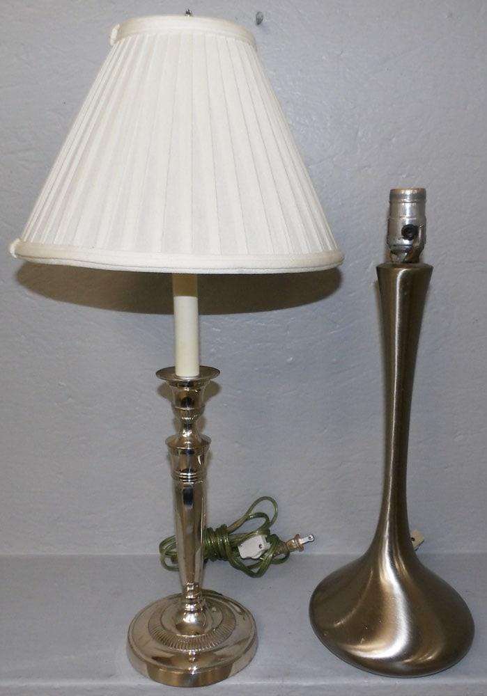 Silver Plate Candlestick Lamp & Stainless Lamp: Silver Plate Candlestick Lamp & Stainless Lamp. 23 3/4" H 10 3/4" Dia ALL DESCRIPTIONS AND ANY CONDITION STATEMENT GIVEN BY LANGSTON AUCTION GALLERY ARE STRICTLY OPINIONS AND LANGSTON'S SHALL HAVE NO