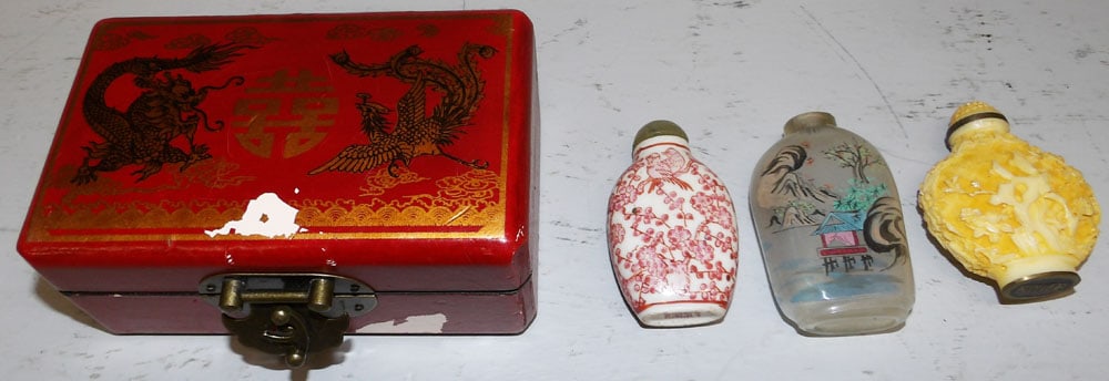 Lot Oriental Glass - Porcelain - Carved Bone Snuff Bottles & Painted Leather Box: Lot Oriental Glass - Porcelain - Carved Bone Snuff Bottles & Painted Leather Box. 2 1/4" H 5" W 3 1/4" D ALL DESCRIPTIONS AND ANY CONDITION STATEMENT GIVEN BY LANGSTON AUCTION GALLERY ARE STRICTLY OPI