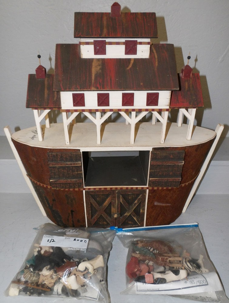 Painted Wood Noah's Ark With Figurines: Painted Wood Noah's Ark With Figurines. 25" H 8" Dia ALL DESCRIPTIONS AND ANY CONDITION STATEMENT GIVEN BY LANGSTON AUCTION GALLERY ARE STRICTLY OPINIONS AND LANGSTON'S SHALL HAVE NO RESPONSIBILITY FO