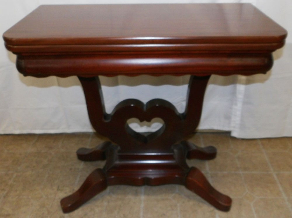 Mahogany Fold Over Top Game Table: Mahogany Fold Over Top Game Table. 28 3/4" H 32" W 16" D ALL DESCRIPTIONS AND ANY CONDITION STATEMENT GIVEN BY LANGSTON AUCTION GALLERY ARE STRICTLY OPINIONS AND LANGSTON'S SHALL HAVE NO RESPONSIBILIT
