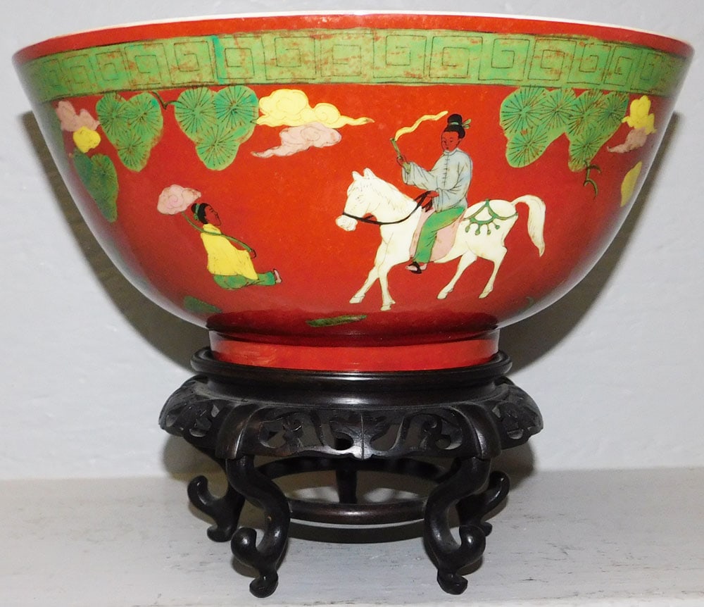 Oriental Porcelain Bowl on Teak Wood Stand : Oriental Porcelain Bowl on Teak Wood Stand . Bowl: 5 1/2" H 12" Dia. ALL DESCRIPTIONS AND ANY CONDITION STATEMENT GIVEN BY LANGSTON AUCTION GALLERY ARE STRICTLY OPINIONS AND LANGSTON'S SHALL HAVE NO R