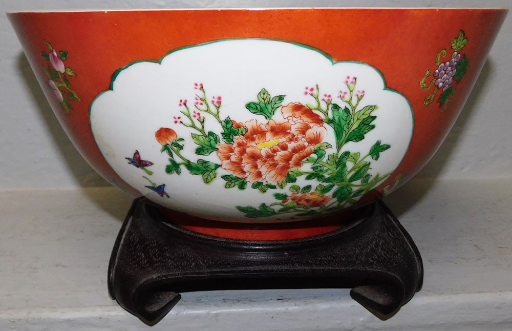 Oriental Porcelain Bowl on Teak Wood Stand : Oriental Porcelain Bowl on Teak Wood Stand . Bowl: 5 1/4" H 12" Dia. ALL DESCRIPTIONS AND ANY CONDITION STATEMENT GIVEN BY LANGSTON AUCTION GALLERY ARE STRICTLY OPINIONS AND LANGSTON'S SHALL HAVE NO R