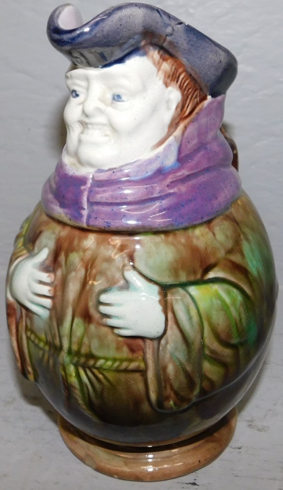 Majolica Figural Toby Mug : Majolica Figural Toby Mug . 8 3/4" H 7" W ALL DESCRIPTIONS AND ANY CONDITION STATEMENT GIVEN BY LANGSTON AUCTION GALLERY ARE STRICTLY OPINIONS AND LANGSTON'S SHALL HAVE NO RESPONSIBILITY FOR ERRORS OR