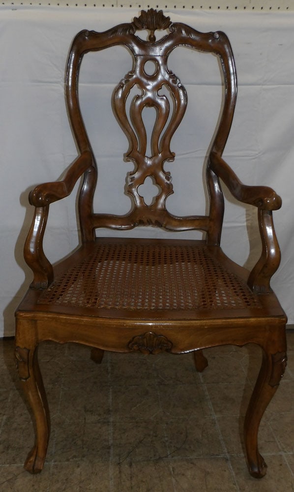 Carved Walnut & Cane Seat Fauteuil: Carved Walnut & Cane Seat Fauteuil. 42 1/2" H 24" W 20 1/4" D ALL DESCRIPTIONS AND ANY CONDITION STATEMENT GIVEN BY LANGSTON AUCTION GALLERY ARE STRICTLY OPINIONS AND LANGSTON'S SHALL HAVE NO RESPONSI