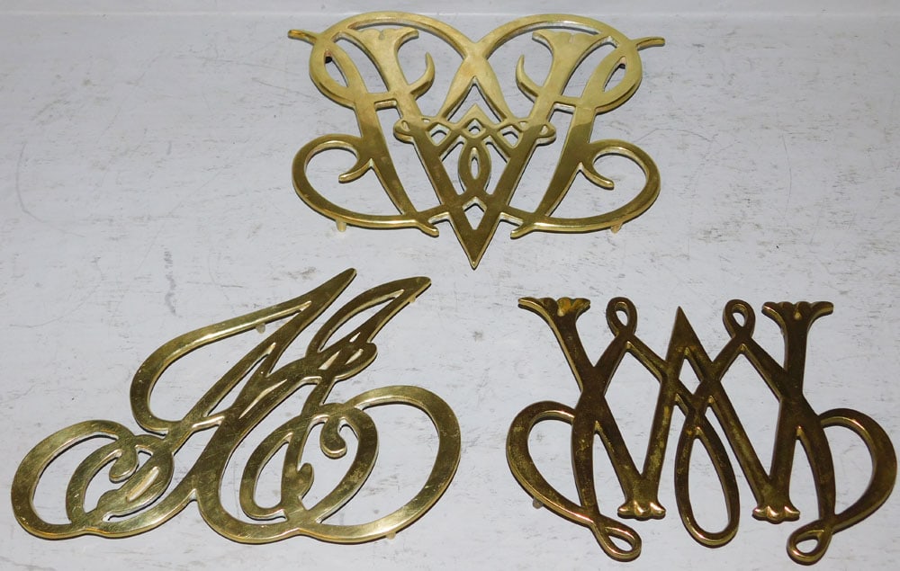 Three Willamsburg Brass Trivets By Virginia Metalcrafters, (Two Queen Anne Cyphers & Ash Lawn Cypher (1 of 5)