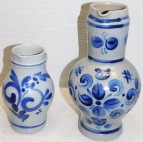 Two German Blue Decorated Stoneware Pitchers