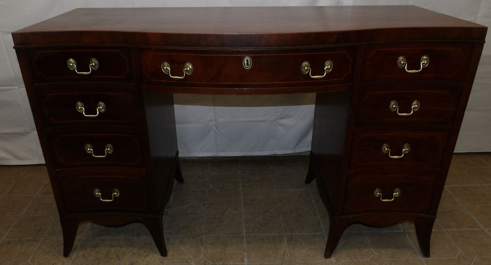 Mahogany Inlaid Serpentine Front Nine Drawer Ladies Desk : Mahogany Inlaid Serpentine Front Nine Drawer Ladies Desk . 30 1/4" H 49 1/4" W 21" D ALL DESCRIPTIONS AND ANY CONDITION STATEMENT GIVEN BY LANGSTON AUCTION GALLERY ARE STRICTLY OPINIONS AND LANGSTON'S