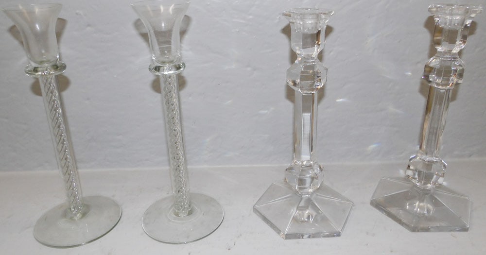 Two Pair of Crystal Candlesticks, (One Pair Signed Val St. Lambert, One Pair Hollow Swirl): Two Pair of Crystal Candlesticks, (One Pair Signed Val St. Lambert, One Pair Hollow Swirl). Up to 9 3/4" H 3 3/4" Dia. ALL DESCRIPTIONS AND ANY CONDITION STATEMENT GIVEN BY LANGSTON AUCTION GALLERY AR