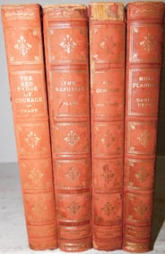 Four Volumes of Leather Bound Books