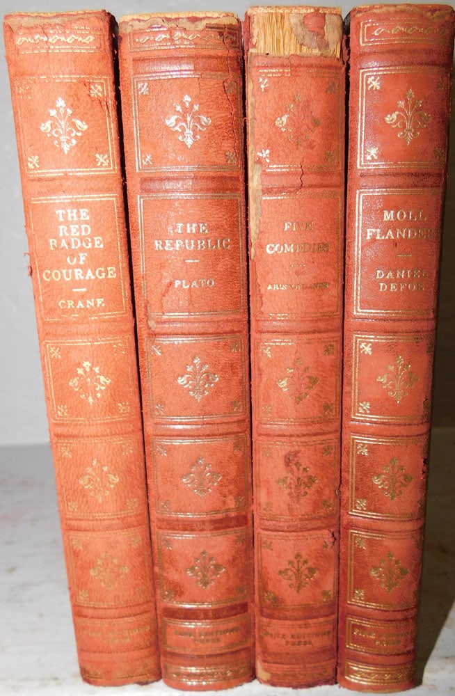 Four Volumes of Leather Bound Books  (1 of 6)