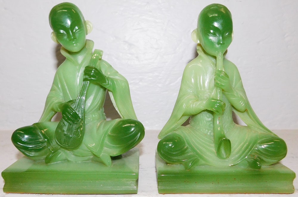 Pair of Faux Jade Oriental Figural Musician Bookends : Pair of Faux Jade Oriental Figural Musician Bookends . 6 3/4" H 4 1/2" W 2 3/4" D ALL DESCRIPTIONS AND ANY CONDITION STATEMENT GIVEN BY LANGSTON AUCTION GALLERY ARE STRICTLY OPINIONS AND LANGSTON'S SH
