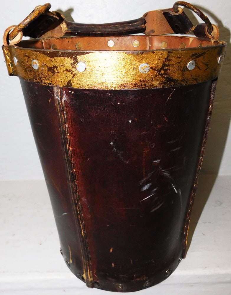 Leather Fire Bucket by Sarreid Limited : Leather Fire Bucket by Sarreid Limited . 12 1/4" H 10 1/2" W ALL DESCRIPTIONS AND ANY CONDITION STATEMENT GIVEN BY LANGSTON AUCTION GALLERY ARE STRICTLY OPINIONS AND LANGSTON'S SHALL HAVE NO RESPONSIB