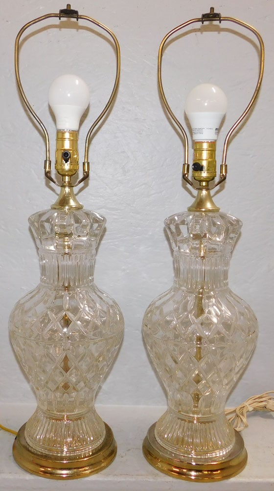 Pair of Crystal Urn Form Base Lamps: Pair of Crystal Urn Form Base Lamps. 26 1/2" H 7" Dia. ALL DESCRIPTIONS AND ANY CONDITION STATEMENT GIVEN BY LANGSTON AUCTION GALLERY ARE STRICTLY OPINIONS AND LANGSTON'S SHALL HAVE NO RESPONSIBILITY
