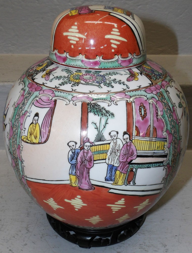 Rose Medallion Style Porcelain Ginger Jar On Teak Wood Stand: Rose Medallion Style Porcelain Ginger Jar On Teak Wood Stand. 11 1/4" H 8 1/2" Dia. ALL DESCRIPTIONS AND ANY CONDITION STATEMENT GIVEN BY LANGSTON AUCTION GALLERY ARE STRICTLY OPINIONS AND LANGSTON'S 