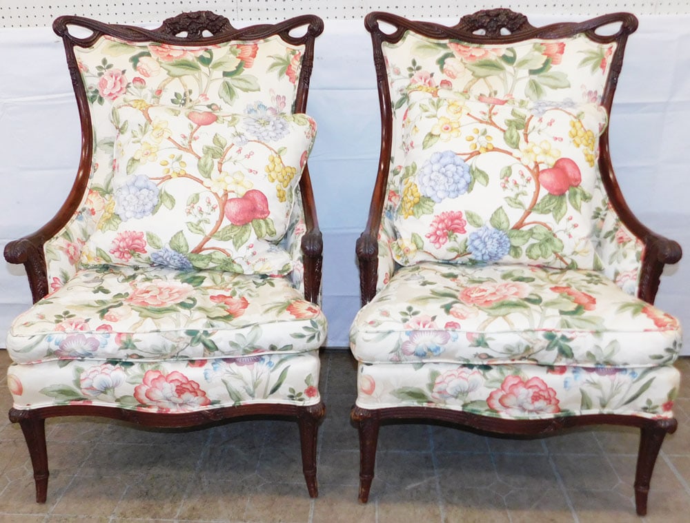 Pair of Carved Mahogany & Floral Upholstered Arm Chairs : Pair of Carved Mahogany & Floral Upholstered Arm Chairs . 44 1/4" H 28" W 31" D ALL DESCRIPTIONS AND ANY CONDITION STATEMENT GIVEN BY LANGSTON AUCTION GALLERY ARE STRICTLY OPINIONS AND LANGSTON'S SHAL