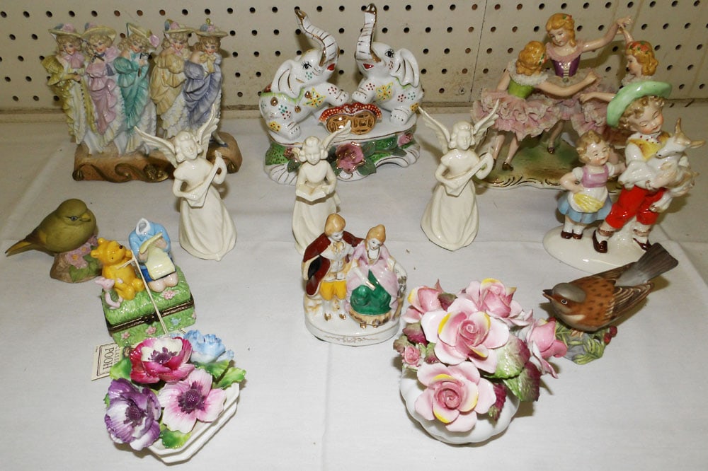 Lot Porcelain Figurines: Lot Porcelain Figurines. 6" H 7" W "ALL DESCRIPTIONS AND ANY CONDITION STATEMENT GIVEN BY LANGSTON AUCTION GALLERY ARE STRICTLY OPINIONS AND LANGSTON'S SHALL HAVE NO RESPONSIBILITY FOR ERRORS OR OMISS